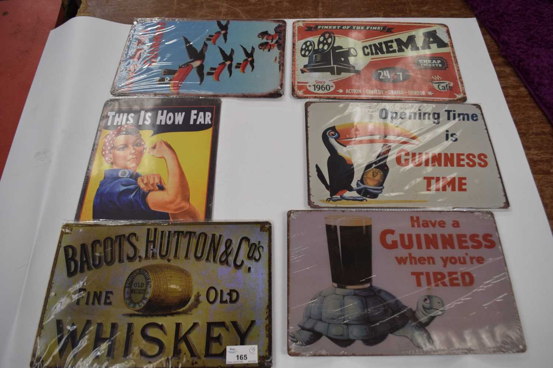 Six thin metal signs to include Guinness and others