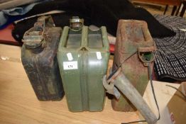 Three vintage fuel cans
