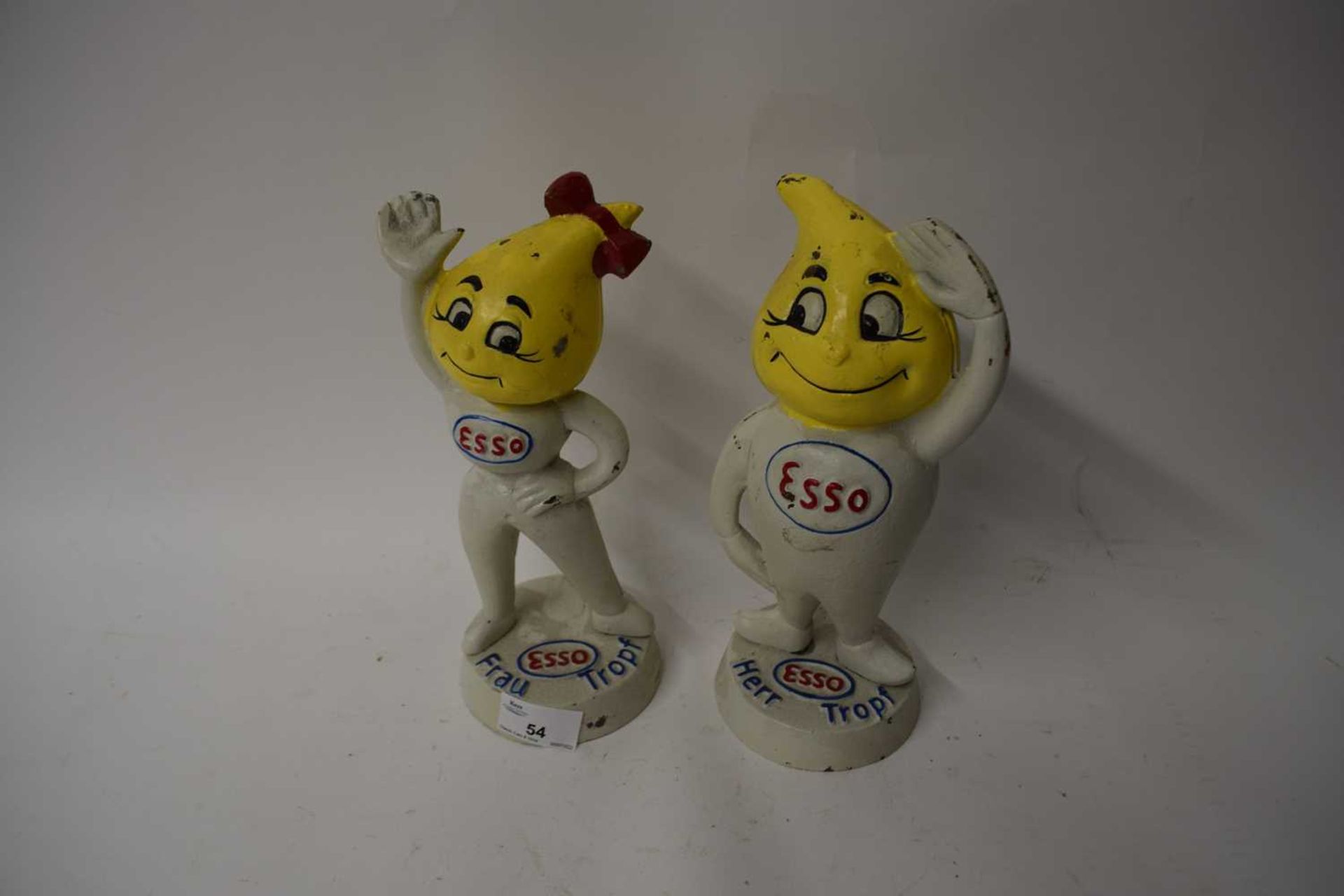 Pair of cast iron Esso advertising figures, Frau Trops and Herr Trops