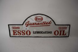 Arched cast iron advertising plaque 'Esso Lubricating Oil'