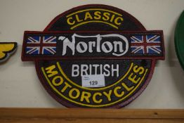 Circular cast iron wall plaque 'Norton'