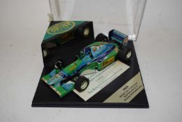 Heritage Racing model of The Benetton Ford B194-V8 race car driven by Michael Schumacher, in Perspex