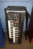 TECHNIKS PCM SOUND C300 PORTABLE ELECTRIC ORGAN WITH CASE AND STAND