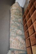 LARGE 20TH CENTURY FLORAL DECORATED WOOL RUG ON A PRINIPCALLY BEIGE AND GREEN BACKGROUND