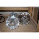 CLEAR GLASS PAPERWEIGHTS TOGETHER WITH TWO GLASS CANDLE HOLDERS