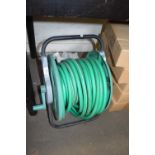 GARDEN HOSE AND REEL