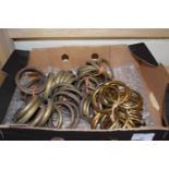 BOX OF VARIOUS VINTAGE BRASS CURTAIN RINGS