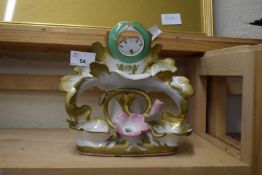 LATE 19TH CENTURY PORCELAIN COMBINATION POCKET WATCH AND DESK STAND WITH FLORAL DECORATION