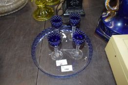 Glass circular dish, blue coloured border with four small blue coloured dishes