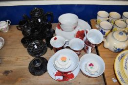 BLACK GLAZED TEA SET TOGETHER WITH A QUANTITY OF MODERN FLORAL DECORATED TABLE WARES