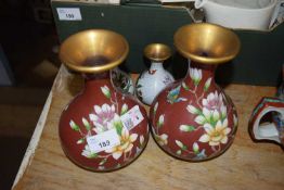 Pair of cloisonne vases with floral decoration together with a further small pair of cloisonne vases
