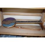 SMALL ETHNIC STRINGED INSTRUMENT WITH BOW DECORATED WITH BEADED DETAIL