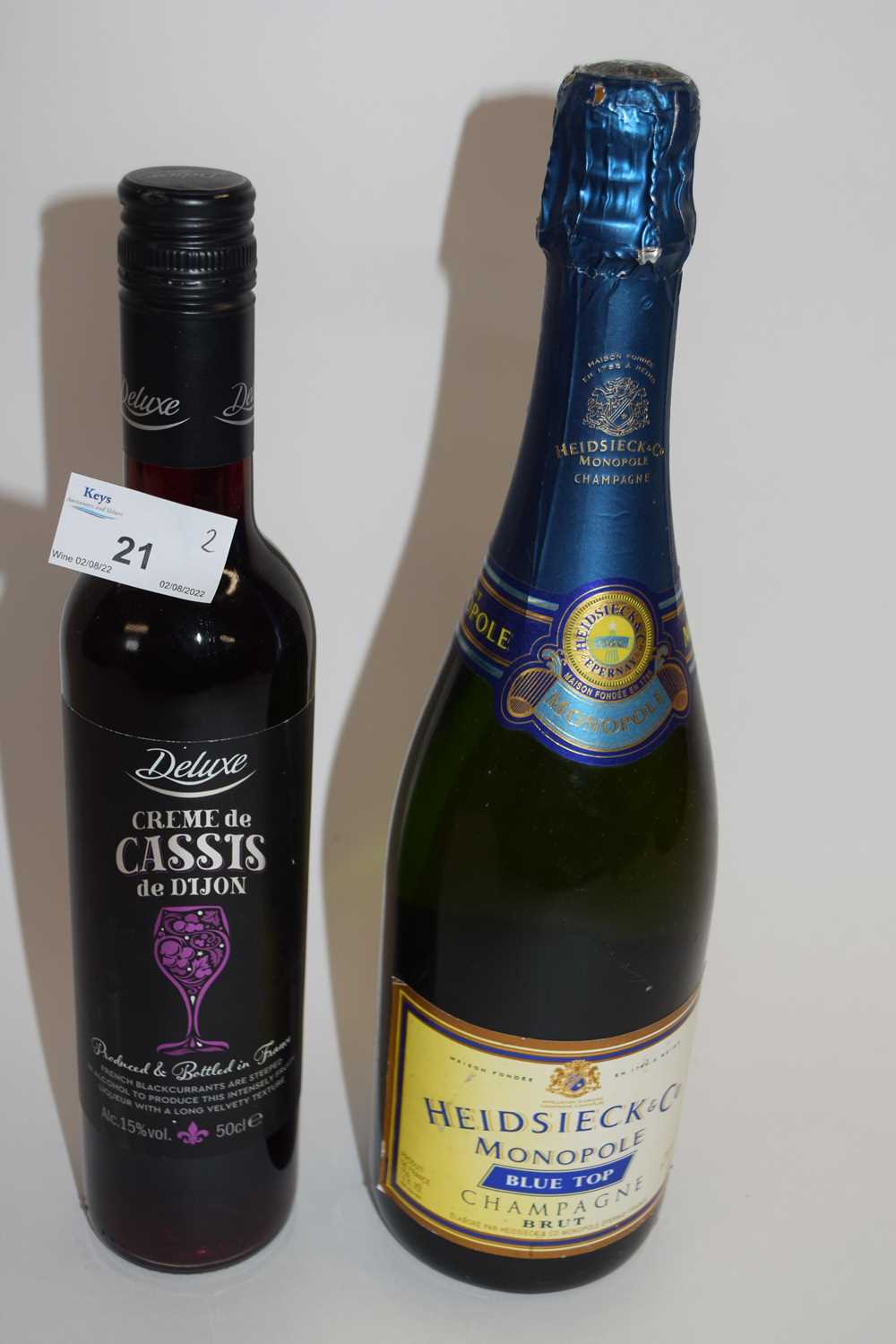 MIXED LOT: 1 BOTTLE OF NV HEIDSIECK CHAMPAGNE AND 1 BOTTLE OF CREME DE CASSIS (2)