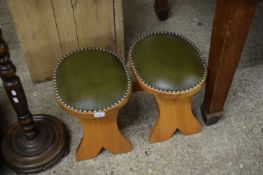 PAIR OF SMALL OVAL TOPPED STOOLS