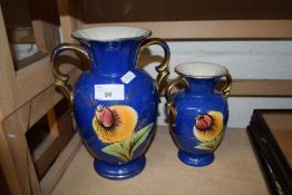 TWO GILT AND FLORAL DECORATED VASES