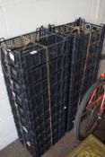 TWENTY BLACK PLASTIC VEGETABLE BOXES