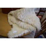 TWO SHEEPSKIN RUGS