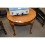 WALNUT VENEERED COFFEE TABLE ON BALL AND CLAW FEET