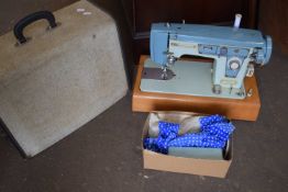 VINTAGE WESTMINSTER SEWING MACHINE AND ACCESSORIES