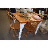 SMALL PINE MODERN KITCHEN TABLE WITH PAINTED BASE TOGETHER WITH FOUR STICK BACK CHAIRS, TABLE