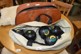 TWO CASES OF LAWN BOWLS AND A CASE OF BOULE BALLS