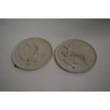 TWO SMALL COPENHAGEN CIRCULAR PORCELAIN PLAQUES DECORATED WITH ANGELS