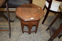 INDIAN OCTAGONAL TOP AND BRASS INLAID OCCASIONAL TABLE WITH FOLDING BASE, 45CM WIDE