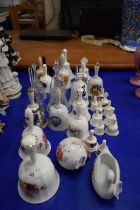 COLLECTION OF VARIOUS CERAMIC AND GLASS DECORATIVE BELLS ETC