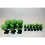 COLLECTION OF 19TH CENTURY GREEN GLASS WARES COMPRISING SIX RUMMERS WITH SQUARE BASES TOGETHER
