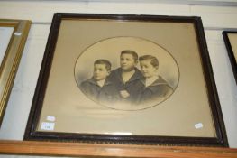 OVAL BLACK AND WHITE PHOTOGRAPH OF THREE BOYS, F/G