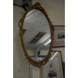 20TH CENTURY OVAL WALL MIRROR IN GILT EFFECT FRAME