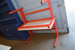 TWO RED METAL FRAMED SCHOOL DESKS