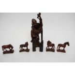 Chinese carved wooden figure of Shou Lai, together with further carved wooden figures of deities and