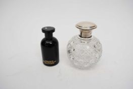 Cut glass scent bottle with silver top, together with a further Biba cologne bottle from the