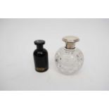 Cut glass scent bottle with silver top, together with a further Biba cologne bottle from the