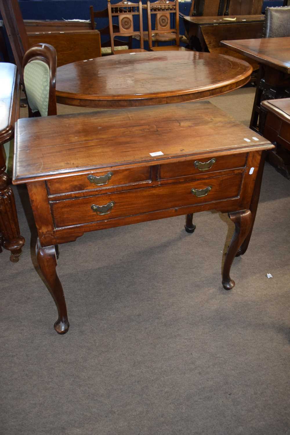 Georgian mahogany lowboy or side table with two short and one long drawer raised on cabriole legs,