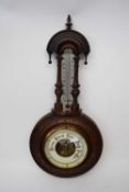 Wheel barometer and thermometer