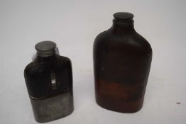 Two leather spirit flasks, one with metal mounts