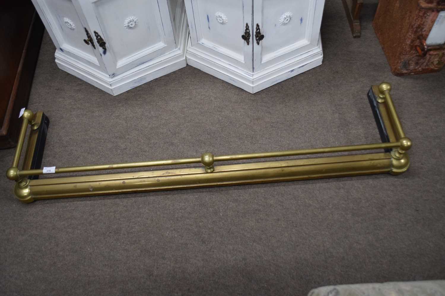 Brass mounted fire fender with rail detail, 130cm wide