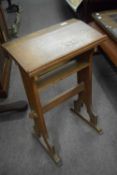 Small late 19th or early 20th century oak bookstand, 45cm wide