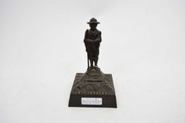 Unusual metal money box shaped as a Boy Scout with the motto 'Be Prepared', the reverse stamped '
