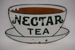 Vintage Nectar Tea enamel advertising sign in the form of a tea cup and saucer, 53cm wide