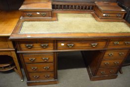 Late Victorian mahogany and ebonised twin pedestal desk with galleried back and tooled leather