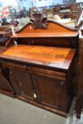 19th century flame mahogany veneered chiffonier with carved pediment over a single shelf and a