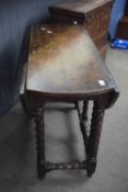 18th century oak oval drop leaf table raised on barley twist legs, 93cm wide