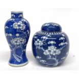 Small Chinese porcelain vase, the blue ground with prunus decoration together with a further Chinese