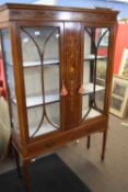 Edwardian mahogany and inlaid china display cabinet of rectangular form with two glazed doors