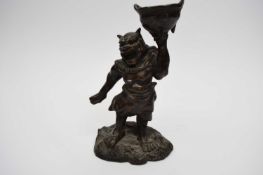 Chinese bronze of a mythical figure holding a cauldron aloft23cm high