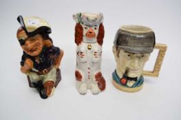 Two character jugs and a Staffordshire style reproduction dog (3)