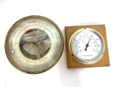 Brass barometer marked HPBN together with a wooden framed thermometerbarometer 13cm diameter